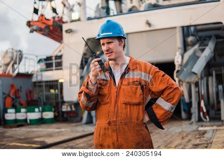 Marine Deck Officer Or Chief Mate On Deck Of Offshore Vessel Or Ship , Wearing Ppe Personal Protecti