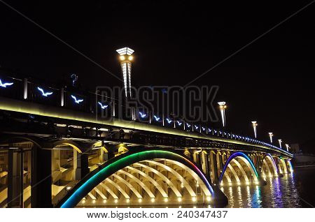Colored lights and bridge
. Photographed in Changchun , China