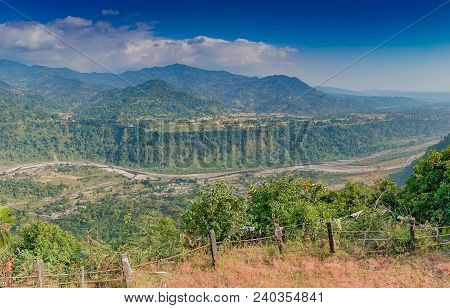 Panoramic Image Of India Bhutan Border At Jhalong , Dooars - West Bengal , India