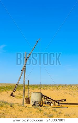 Old Sweep Well And Shadoof In Steppe.