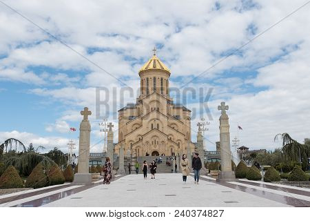 Tsmind Sameba Cathedral In Tbilisi - 22 April: Tourists Visiting Tsmind Sameba Cathedral In Tbilisi.