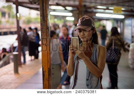 Portrait Of Young Beautiful Asian Tourist Woman Exploring The City Of Bangkok, Thailand