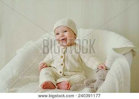 Happy Baby On The Chair