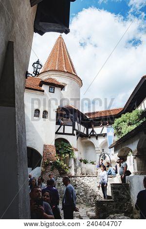 Bran, Romania - September 7, 2017: Tourists Visit The Courtyard Of Bran Or Dracula Castle And Make B