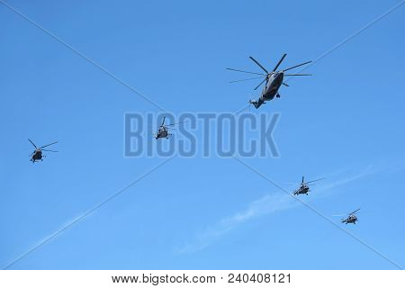 Moscow, Russia - May 9, 2018: Russian Military Transport Helicopter Mi-26 And Four Transport-assault
