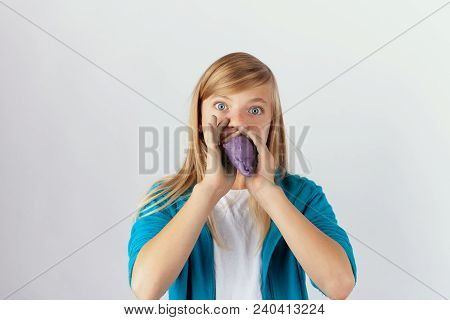 Cuge Girl Playing With Her Handmade Purple Slime In Front Of Her Face