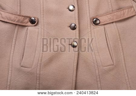 Detail Of Cashmere Topcoat With Pockets. Close Up Female Beige Buttoned Overcoat.