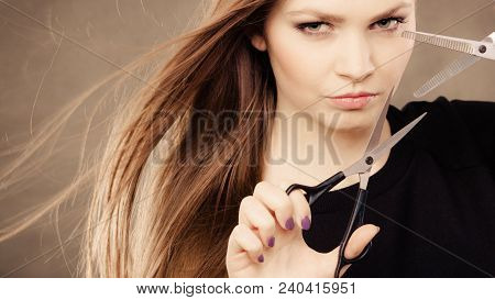 Professional Elegant Female Barber With Scissors.
