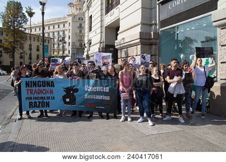 VALENCIA, SPAIN - MAY 12, 2018: Unidentified protesters in an anti bullfighting demonstrating in the streets of Valencia. Bullfighting currently takes place in nine countries around the world.