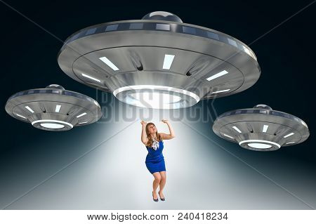 Woman Being Abducted By Ufo - Concept Of Alien Abduction