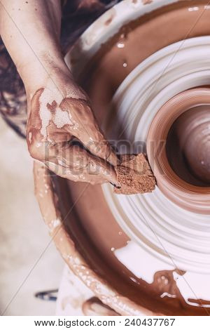 A Spinning Potter's Wheel With A Vessel. Close-up.