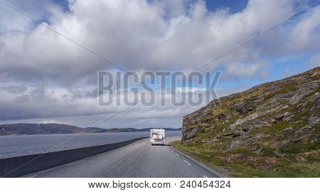 Northern Norway, Camper Van On The Narrow And Windy Road Leading To Hammerfest On A Summer Day
