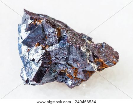 Macro Shooting Of Natural Rock Specimen - Crystalline Cuprite Stone On White Marble Background From 