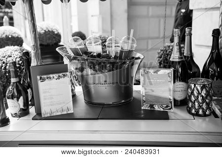 Paris, France - June 01, 2017: Bar Counter Outdoors On Building Background. Menu, Champagne Bottles,