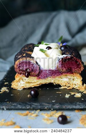Cake Of Saint-onore From Puff Pastry, Profiteroles, Currant Cream And Whipped Cream. Classic French 