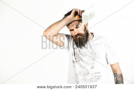 Man With Tired Face Touches Forehead. Hard Labour Concept. Man With Beard In Dirty Shirt, Copy Space