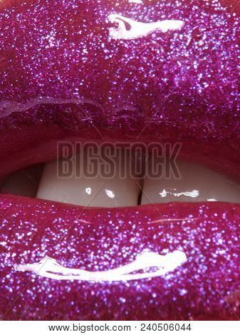 Glamour Magenta Gloss Lip Make-up. Fashion Makeup Beauty Shot. Close-up Female Sexy Full Lips With C