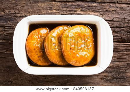 Chilean Sopaipilla Pasada Deep-fried Pastry Covered In Chancaca Cane Sugar Sauce, A Popular Snack In