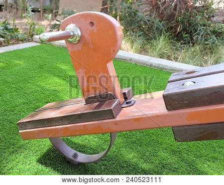 Children Playground, Wooden Horse Seesaw, Teeter Totter Or Teeterboard In Outdoor Park.