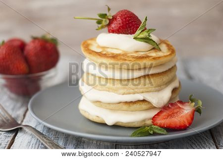 Dessert Pancakes With Cream And Strawbery. Health Breakfast Fruit Berry Vitamine Rustic Background