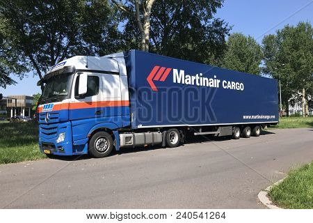 Almere, Netherlands - May 28, 2018: Martinair Cargo Truck Parked By The Side Of The Road. Martinair 