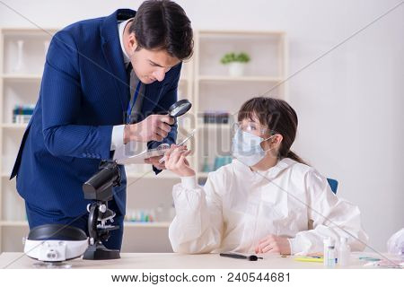 Expert criminologist working in the lab for evidence
