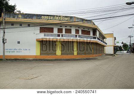 Classic Retro Commercial Building And House In Small Alley With Traffic Road At Countryside On July 