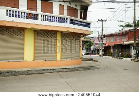 Classic Retro Commercial Building And House In Small Alley With Traffic Road At Countryside On July 