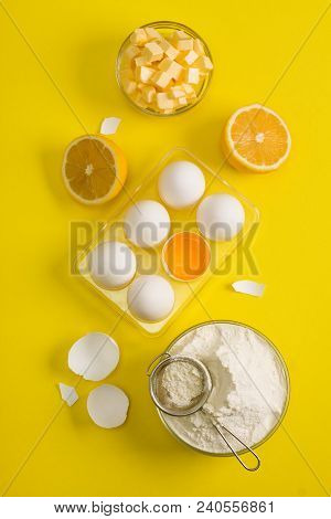 Baking Flat Lay Background With White Eggs, Eggshells, Yolk, A Cup Of 


Floor, A Cup Of Butter, Two