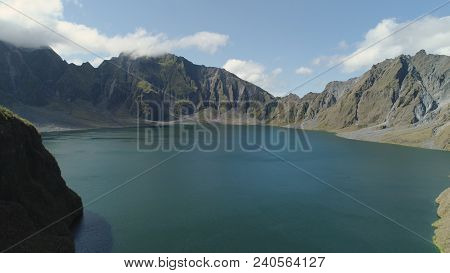 Crater Lake Of The Volcano Pinatubo Among The Mountains, Philippines, Luzon. Aerial View Beautiful L