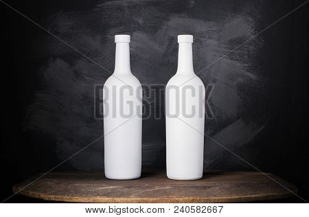 Wine Bottle Mock-up. Red Wine Bottle On Wooden Background
