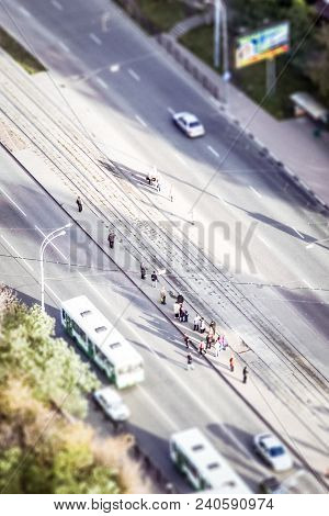 People Stand At The Bus Stop And Wait For The Bus Birdseye View
