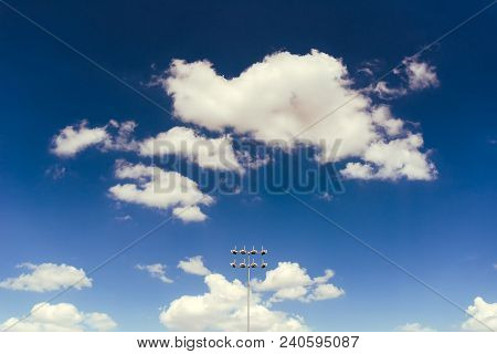 Stadium Lights Against Blue Sky With White Clodus, Minimalistic Composition