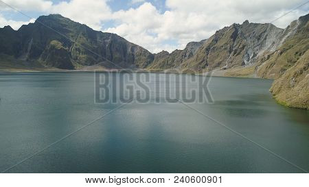 Crater Lake Of The Volcano Pinatubo Among The Mountains, Philippines, Luzon. Aerial View Beautiful L