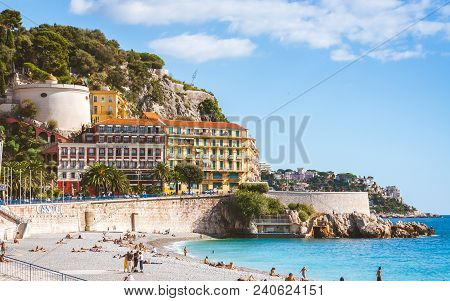 Nice, France - October 13, 2009: Beautiful Nicoise Architecture And People Relaxing On Beach That St