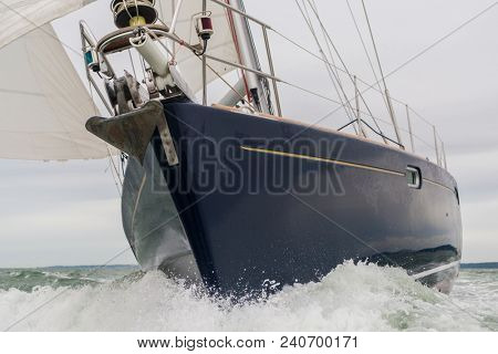 Close up of sailing boat, sail boat or yacht at sea