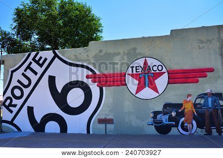 Tucumcari, New Mexico - July 21, 2017: Texaco Gas Station In Tucumcari, Showing An Old Chrysler, The