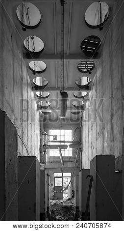 A Ceiling In An Abandoned Industrial Building In Black And White