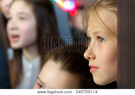 Kiev, Ukraine, 21.03.2015 Face Profile Of A Young Beautiful Blonde On The Background Of A Crowd Of G