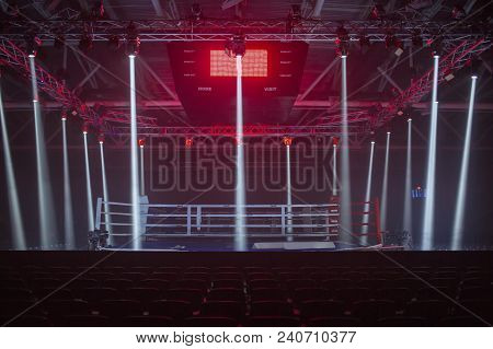 Brovary, Ukraine, 14.11.2015 Boxing Ring In Low-light Spotlights And Red Illumination From Above. An