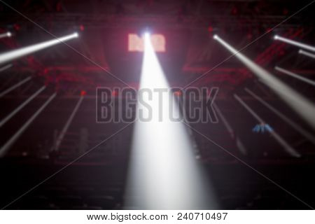 Blurred Empty Auditorium And Boxing Ring Lit By Lights Of Spotlights