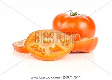 One Red Tomato And Fresh Cut Circle Slices Isolated On White Background