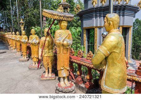 The Temple Of The Buddhist Religious Complex Of Wat Kraom Is Surrounded By Countless Statues Like Th