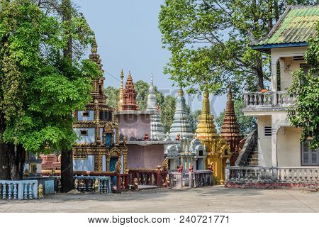 Close-up Of Multi-colored Religious Constructions In The Form Of A Tower In The Temple Wat Kraom Sih