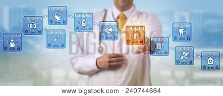 Unrecognizable Doctor Of Medicine Reviewing The Medical Record Of A Female Patient In A Healthcare B