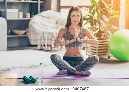 Yoga Is My Lifestyle! Sportive Thoughtful Pensive Beautiful Charming Woman With Close Eyes Wearing S