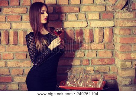 Elegant Beauty Lady Long Hair Full Make Up Wearing Black Dress Tasting Wine In Rural Cottage Interio