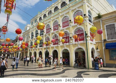 Macau, China - September 11, 2013: Unidentified People Walk By The Senado Square In Macau, China.