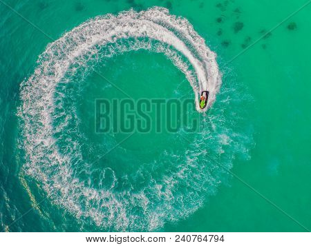 People Are Playing Jet Ski At Sea During The Holidays. Aerial View And Top View.