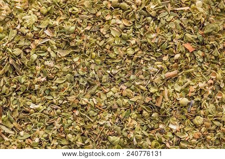 Oregano Spice Detail Macro Texture Background Pattern. Spilled Oregano Spice Macro.